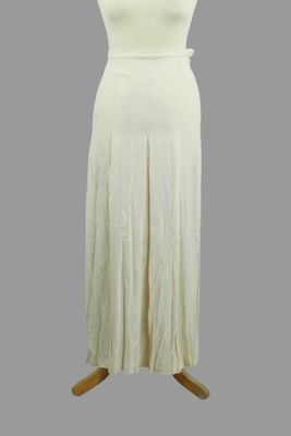 SAINT LAURENT rive gauche. Jupe longue en crêpe ivoire à lar…