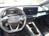 the interior of a car with a steering wheel, dashboard, and dash board
