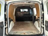 a white van that is parked in a garage