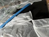 a picture of a laptop computer sitting on top of a plastic bag
