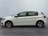 a picture of a white car parked in a parking lot