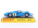 a blue toy car sitting on top of a yellow box