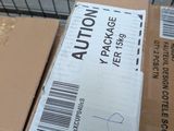 a box that is sitting on top of a carton