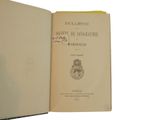 an open book with a picture of a coat of arms and a coat of arms on it