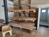 a pile of wood on the floor in a room