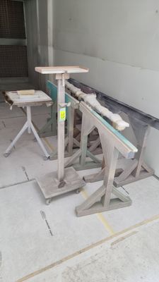 two tables that are sitting in the middle of a room