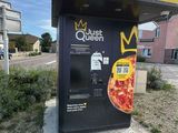 a vending machine on the side of the road