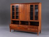 an image of a wooden cabinet with glass doors and drawers