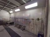 a large room with a lot of concrete walls