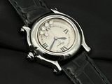 a close up of a watch on a black cloth