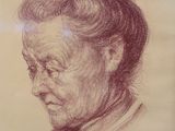 drawing of an old woman with a bun in her hair