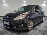 a picture of a black ford c - max parked on a checkered floor