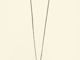 silver chain with a heart pendant on a white background