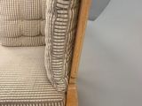 an image of a chair made out of wood and fabric