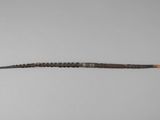 an image of a long knife on a white surface