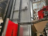 a machine that has a red sheet on the back of it