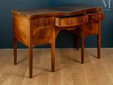 a small wooden desk with two drawers on it
