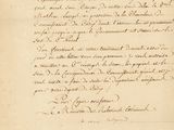 un gros plan d'un morceau de papier sur lequel on a écrit
