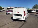 a white van that is parked in a parking lot