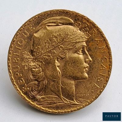l'image d'une pièce d'or sur laquelle figure une tête de femme