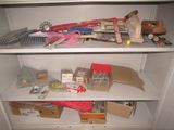 a shelf with many items on it in a room