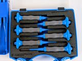 a bunch of tools in a blue case on a table