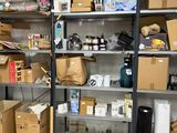 a room with a lot of boxes and boxes on the shelves