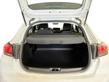 the back of a white car with its trunk open on a white background