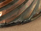 a close up of a metal object on a table