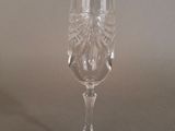 a wine glass that is sitting on a table