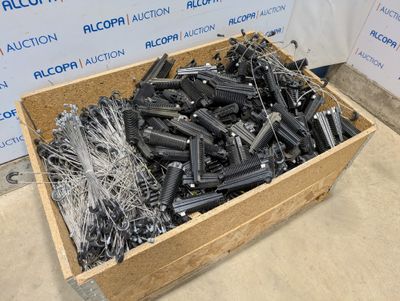 a wooden box filled with lots of different types of screws