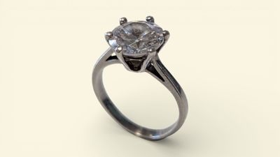 a close up of a diamond ring on a white background