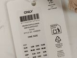 a tag that says only on it next to a stuffed animal