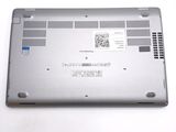a silver laptop with a sticker on the back of it