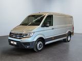 the silver van is parked in the empty room of the building