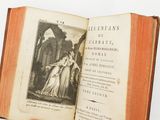 an open book with a picture of a woman on it