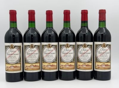 six bottles of red wine lined up in a row on a white surface