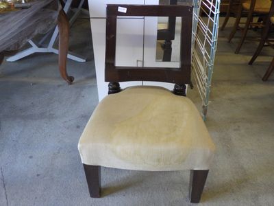 a chair that is sitting in the middle of a room