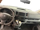 a dashboard of a car with a steering wheel and dashboard controls
