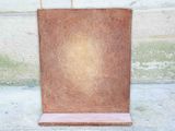 a painting of a vase sitting on the sidewalk