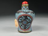 chinese blue and red snuff bottle with dragon decoration