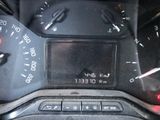 a close up of a car dashboard with a clock on it