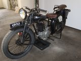 a motorcycle that is parked in a garage