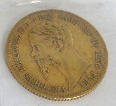 an image of a gold coin with a woman ' s face on it