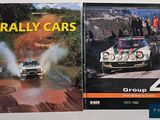 two books about rally cars on display on a table