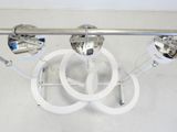 three lights that are hanging from the ceiling in the room
