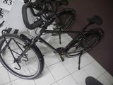 two bikes parked next to each other on the floor