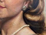 portrait of a woman with a pearl necklace and pearl earrings