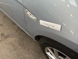 a close up of a car with a sticker on it