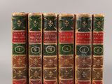 a set of five books sitting on top of each other